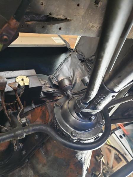 Universal joint mated to the engine.  While the car is a 1915 touring body, frame and axles, the engine is a 1922 model, painted orange at some point in its life.