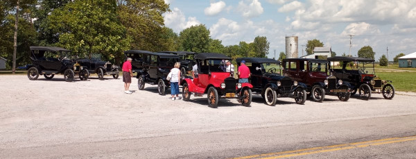 Heading out to the Biergarten after a great lunch. 10 model T's!