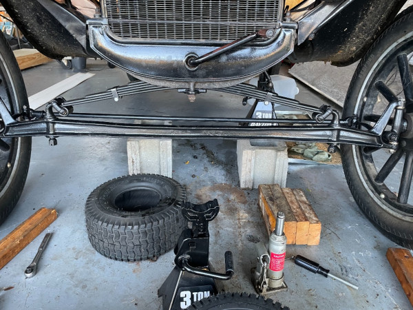 4–1/2 inches now from the top of the axle to the bottom of the hanger vs. 2-1/2 with the old spring put the caster right at 3/8“ (~4-3/4 deg.)