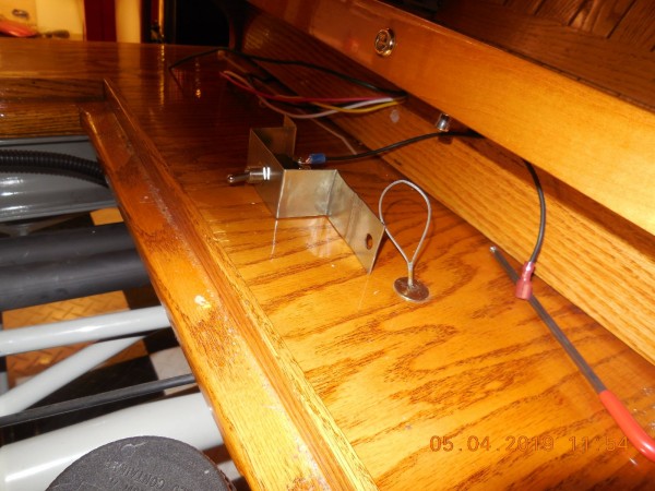 Bracket I fabricated to mount the TS toggle. it gets attached to the seat riser.