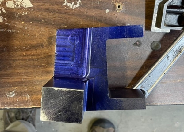 One of the front drop brackets fresh off the mill.