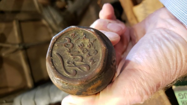 Believed to be the original cap.