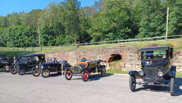 Some of the group parked in front of a few of the ovens.