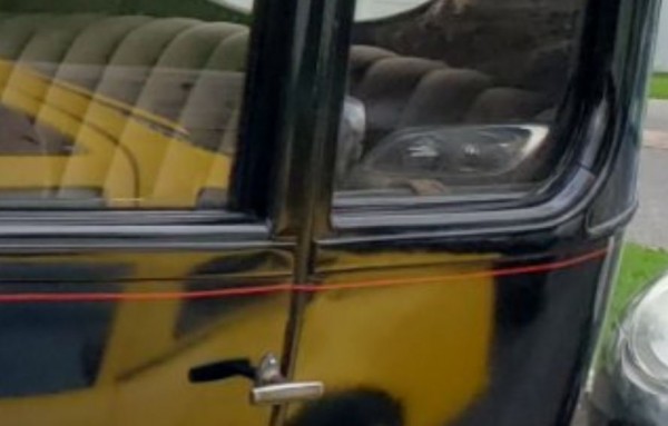 Metal cover over wood around windows.JPG