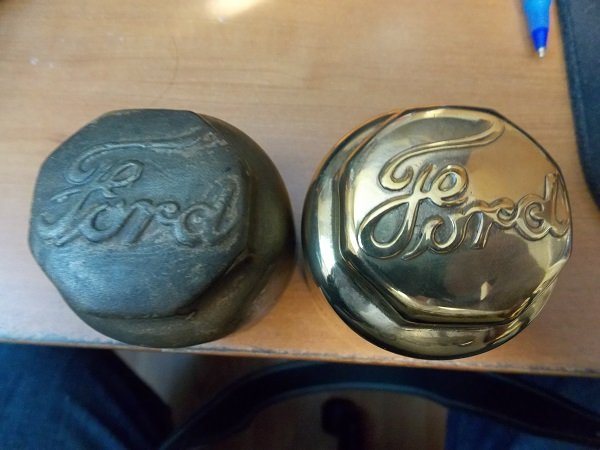hubcap 1911 original and repro.jpg
