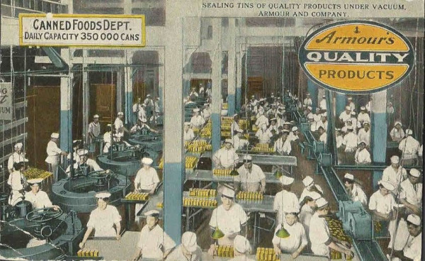 sealing tins under vacuum.JPG