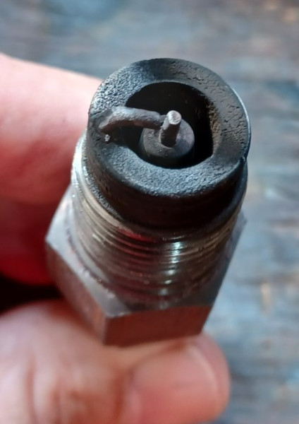 12K miles on plugs..clean but showing a little electrode wear