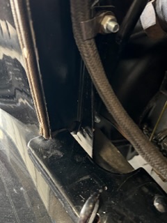 Passenger side bracket