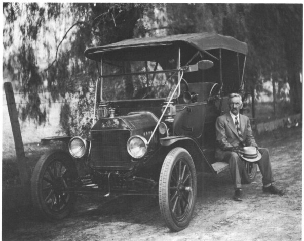 1911 Canadian man sitting on runningboard.JPG