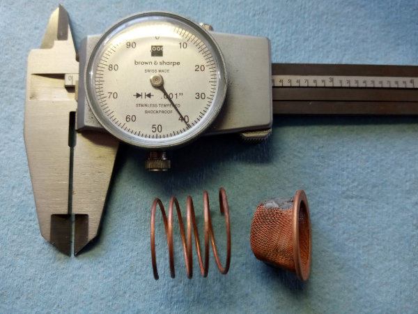 Fuel strainer and spring.png