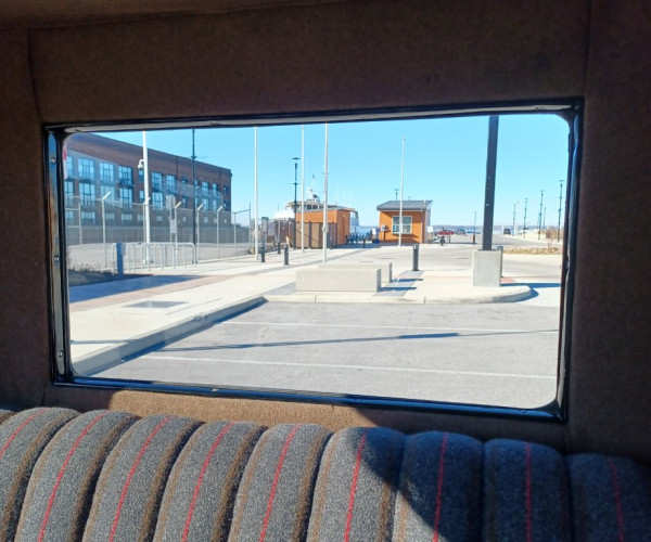 Stopped at the dock where the boat I used to pilot is hiding behind the brown building.