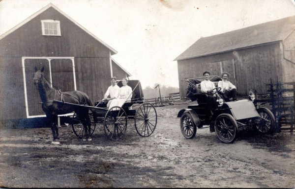 Buggy and horseless carriage.JPG
