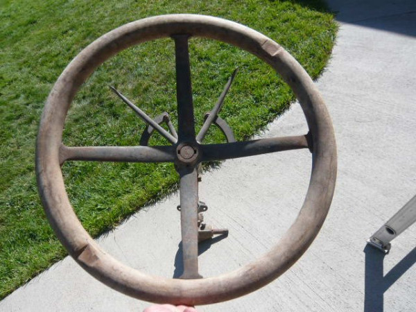 Steering wheel looking down at controls.