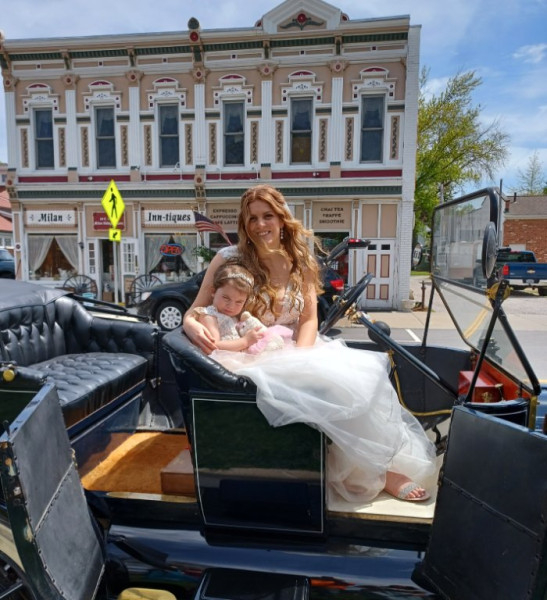 Bride with bashful flower girl