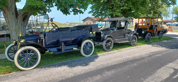 Cars lined up on display waiting to give rides afterward