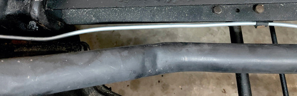 fuel line along frame.JPG