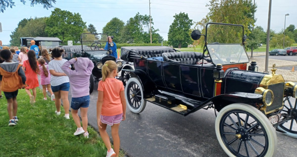 Teachers had the kids do a &quot;walk by&quot; to view our 5 cars. They loved them.