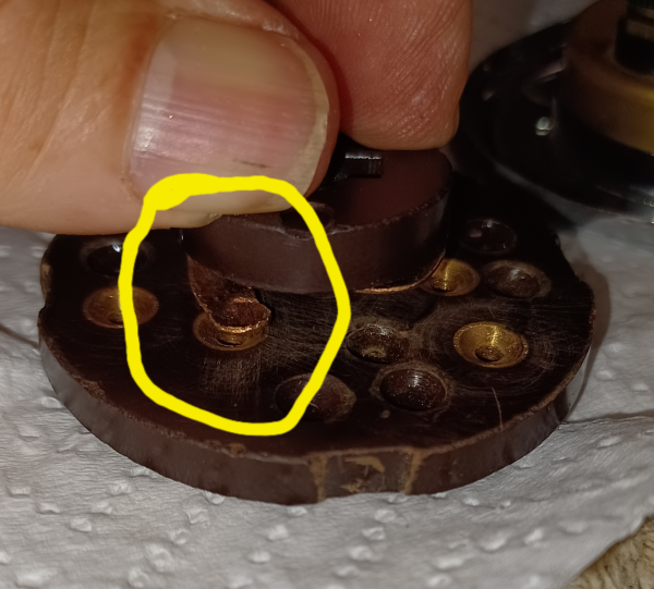 Repop switch showing poor contact of mag point..circled in yellow