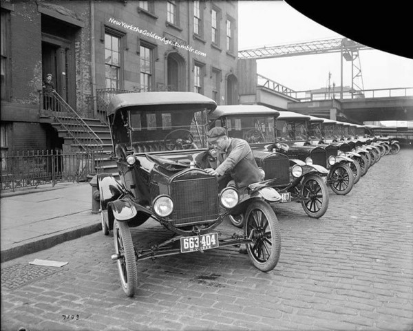 Fleet of Ford Model T cabs lined up for inspection at a garage under the Brooklyn bridge 1922..jpg