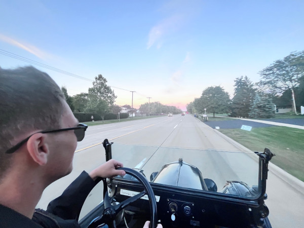 Picture my brother got driving my 1919 runabout racing the clock to get home before dark!