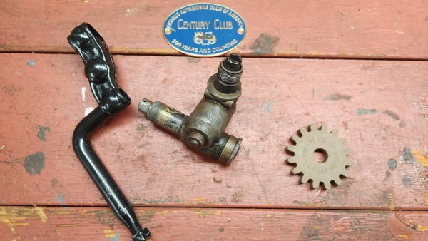 4 treasures from Hershey in 2024... speedometer swivel bracket and arm... Stewart-Warner 2.5:1 speedometer swivel and fiber gear. And last but not least, by showing the T on the showfield, I recieved an AACA Century Club plaque which acknowledged that I brought out a 100+ year old car to the show!