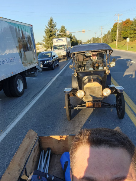 Heading into the show... I live about 6 miles away, so we caravanned to the show with the mustang keeping up our tail.