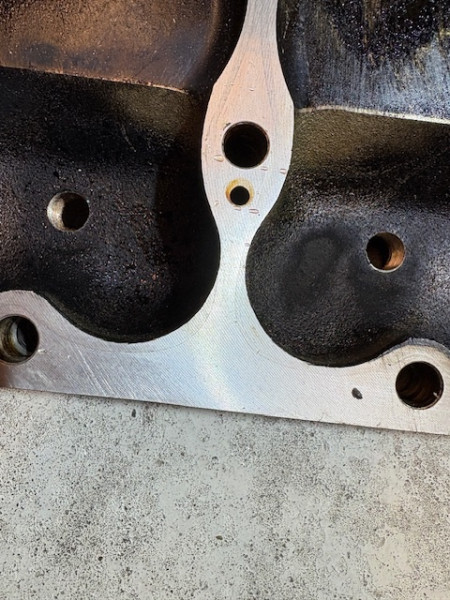 The markings show the folded edge does not contact the head