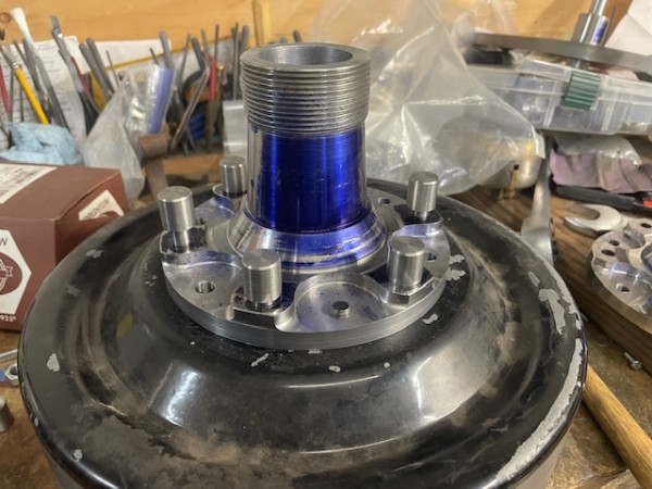 A hub and pins mocked up with the brake drum and safety hub.