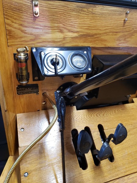 Small extinguisher on dash.