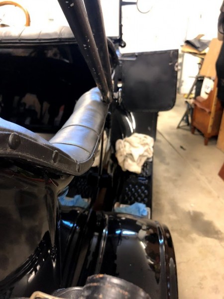 This side angles in toward car and will never lay down