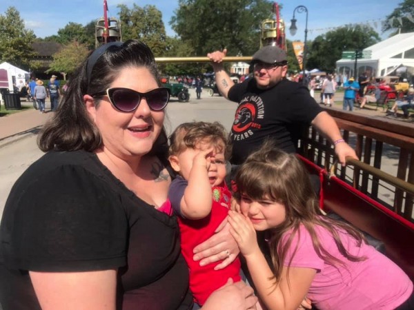 My daughter, Giulia, with her fiance in the back, and my grandson, Ben (we call him Bumbolini.)
