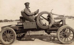 Capt. Claude H Williams and suitably modified model T Ford
