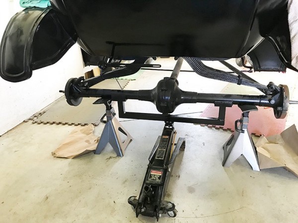 First step - lift the rear end and remove the wheels.