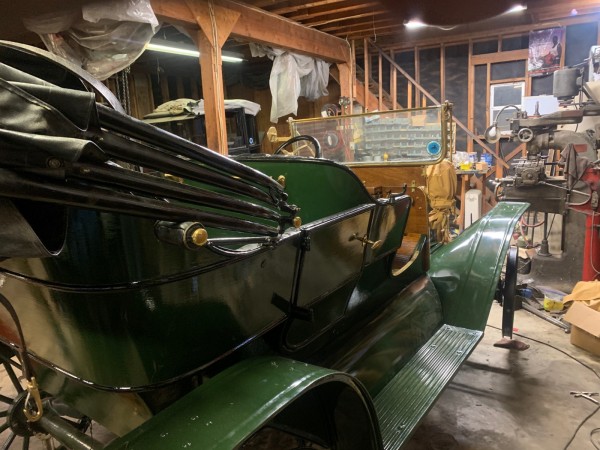Passenger side of 1909 in workshop