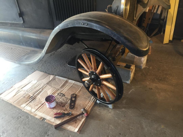 Restored front wheel installed, fully packed with grease and ready for her first new tire in at probably fifty years.