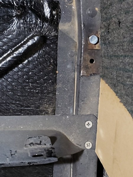 Original mounting holes at top with clip reattached and remounted bracket 5&quot; back at bottom