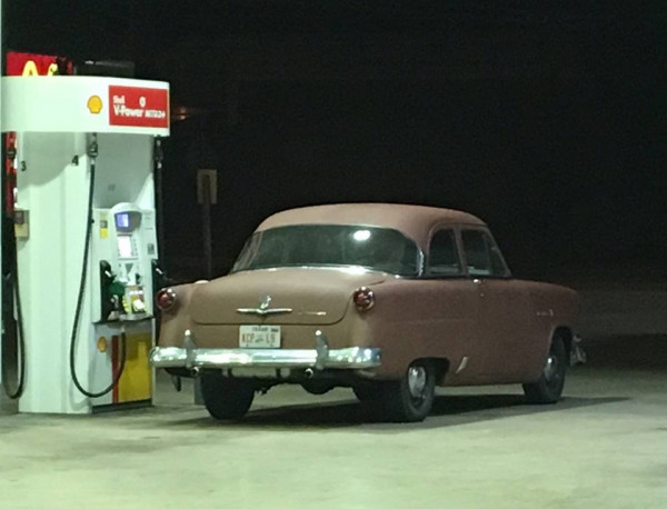 54 Ford gas pump night drive.jpg