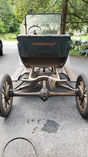 Rear end. Yes, a battery box has been added for a later engine with starter.