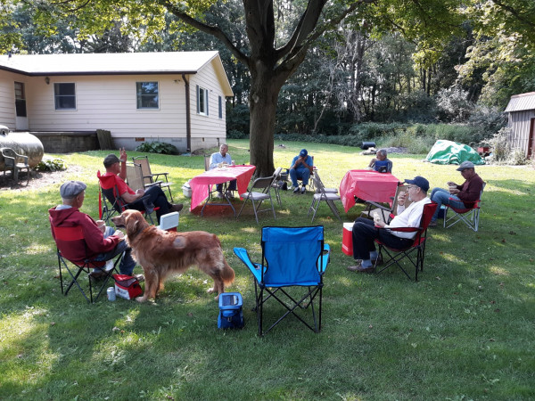 Our usual safe gathering. Champ begging for food while Mike explains something. What a great day!