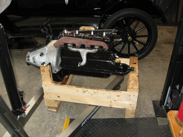 engine on wood stand.JPG