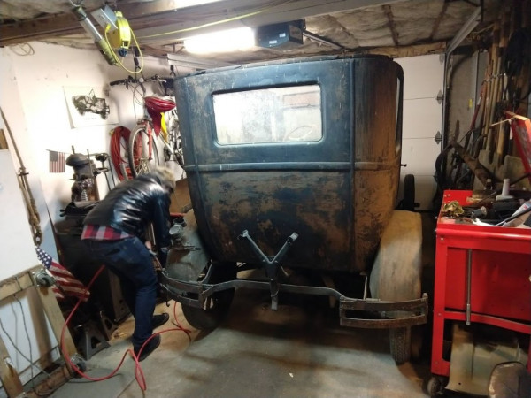 model t in garage.jpg