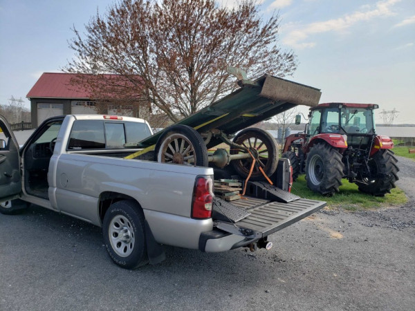 Thank goodness the guy had a tractor loader to help!