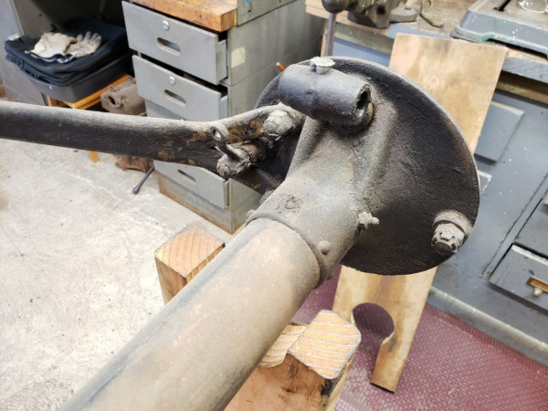 Backing plate.  Might be hard to see, but interesting to see all the brazing at the wishbone connection.