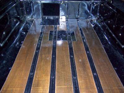 Finished bed w wood long view web.jpg