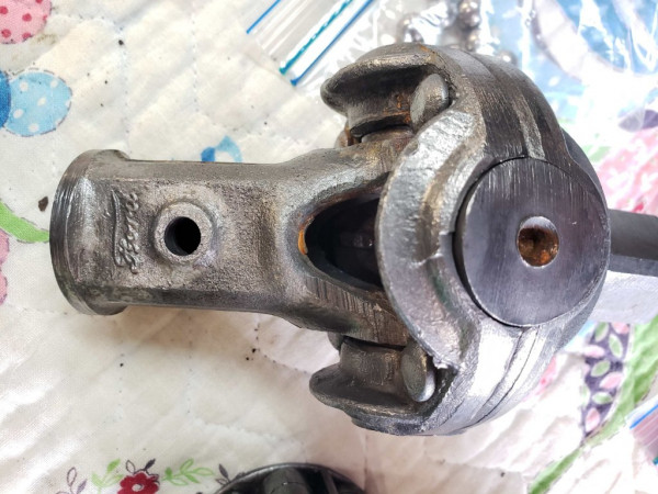 Original FORD Universal joint, checked out within tolerance and will be used again.  FORD labeled everything!