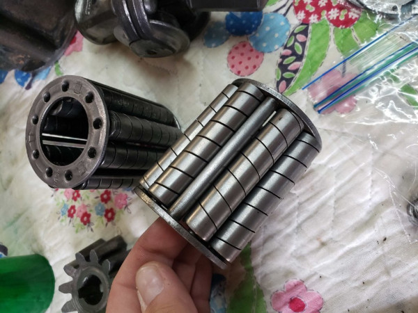 Driveshaft bearings.  The one I am holding is a nice and tight replacement for the original one in the back which was rather loose.
