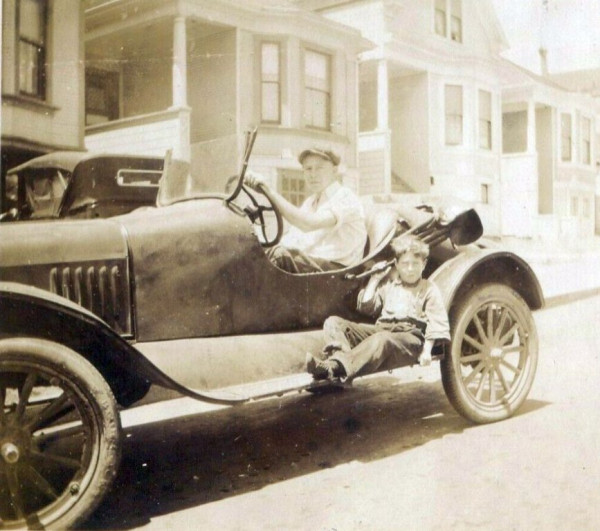 speedster with kid on running board.jpg