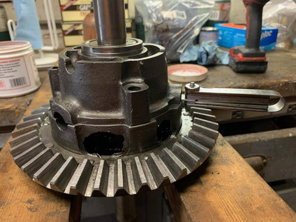 Carrier being put back together. Feeler gauge trick is one from a Stan Howe post.  Put your two axles in and keep inserting progressively thicker gauges until you get the desired backlash. Then you know how thick your disks between axles need to be. Brilliant and simple, just like Mr. Howe.